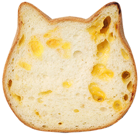 plain yellow bread in the shape of a cat head